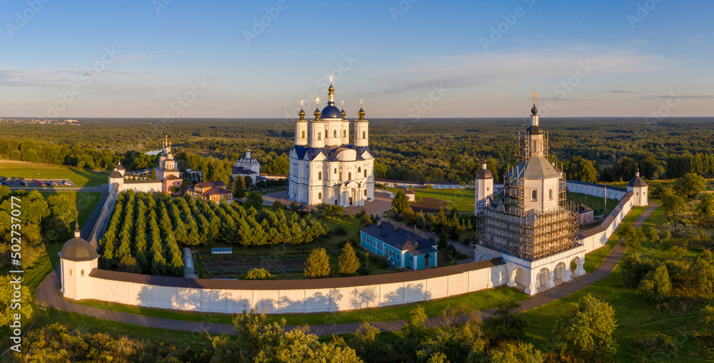 Drone view of Svensky Uspensky Monastery on summer sunset. Suponevo, Bryansk Oblast, Russia.
