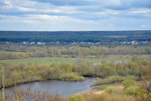 landscape with trees and clouds