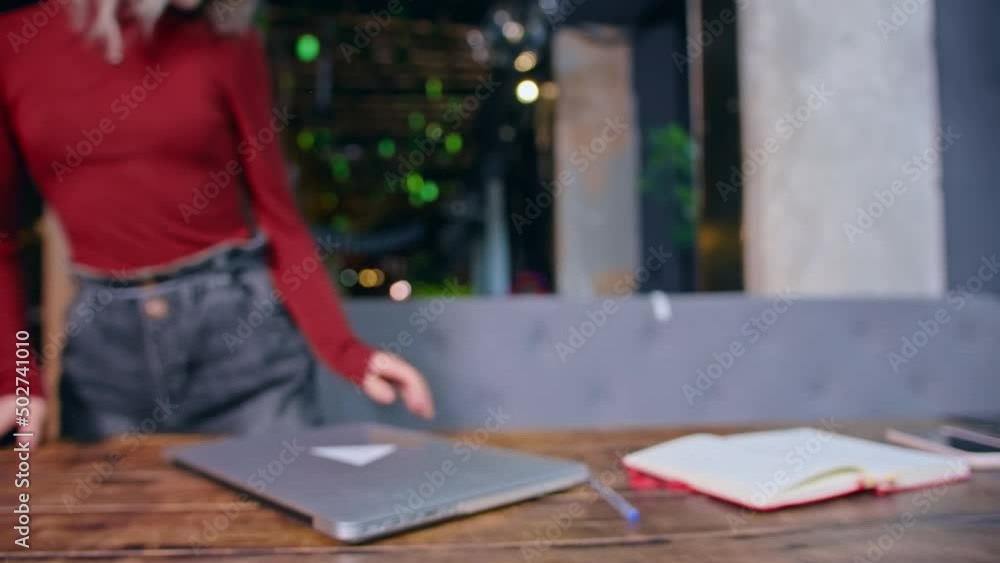 sad tired young woman works with computer at the table. business time. rest and work sad tired young woman works with computer at the table. business time. rest and work