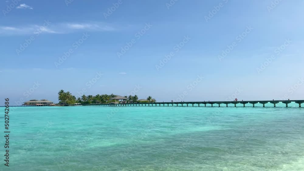 This video shows a wooden bridge connecting two islands in the Indian Ocean. The video is suitable for your projects about travel, vacations and other similar topics. This video shows a wooden bridge connecting two islands in the Indian Ocean. The video is suitable for your projects about travel, vacations and other similar topics.