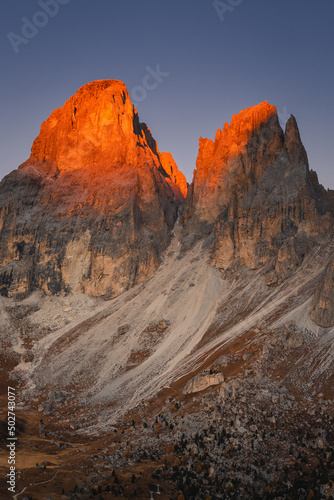 Autumn in the Italian Dolomites. The most beautiful time of the year to visit this place. Beautiful colors and breathtaking views. Mountain peaks above the valleys.