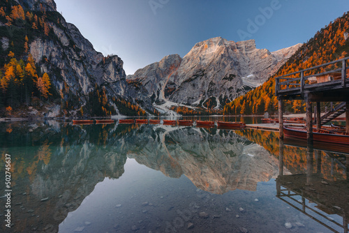 A quiet morning at Lago di Braies in the Italian Dolomites. The autumn mood of the photo creates a great atmosphere.