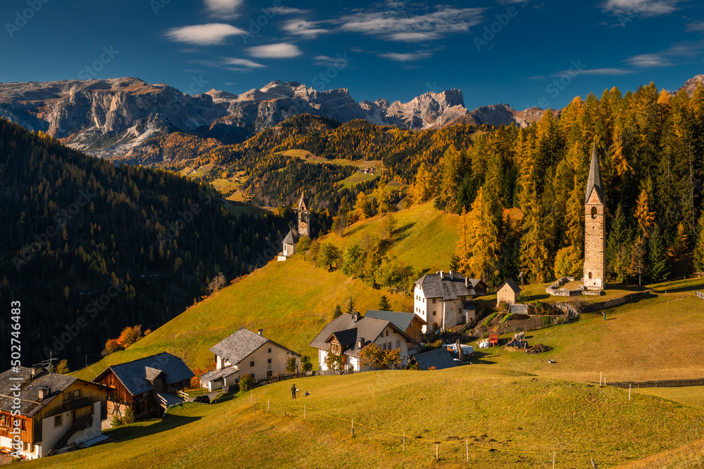 Autumn in the Italian Dolomites. The most beautiful time of the year to visit this place. Beautiful colors and breathtaking views. Mountain peaks above the valleys. Autumn in the Italian Dolomites. The most beautiful time of the year to visit this place. Beautiful colors and breathtaking views. Mountain peaks above the valleys.