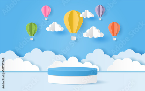 Paper cut of summer banner with blue and white color cylinder podium for products display presentation. Landscape of hot air balloons and clouds on blue sky background. Vector illustration