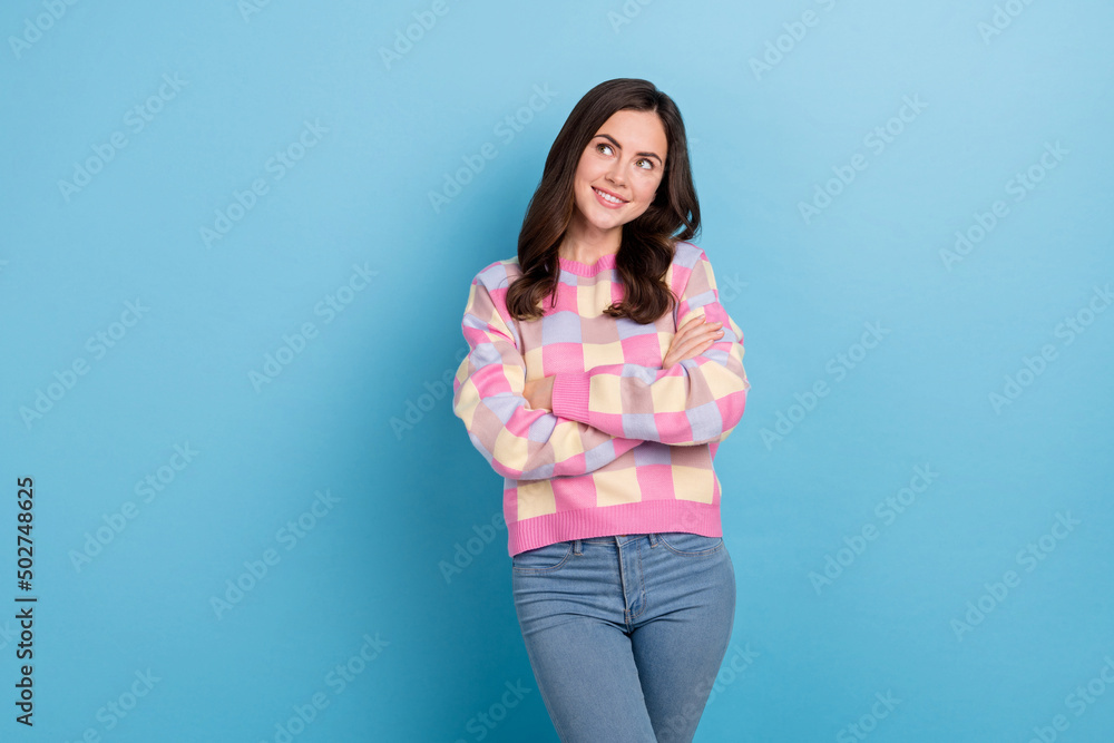 Photo of young adorable girl curious look empty space folded hands minded dreamy isolated over blue color background Photo of young adorable girl curious look empty space folded hands minded dreamy isolated over blue color background