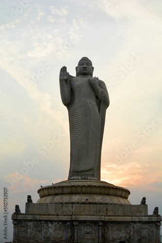 Statue of Lord Buddha, Hyderabad, Telangana, India. It is the world's tallest monolith of Gautama Buddha, erected on Gibraltar Rock in the middle of Hussain Saggar lake. photo