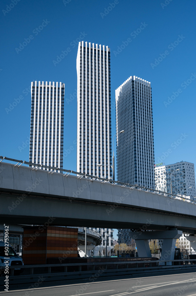 high-rise buildings in Moscow against the blue sky. Urban spring landscape