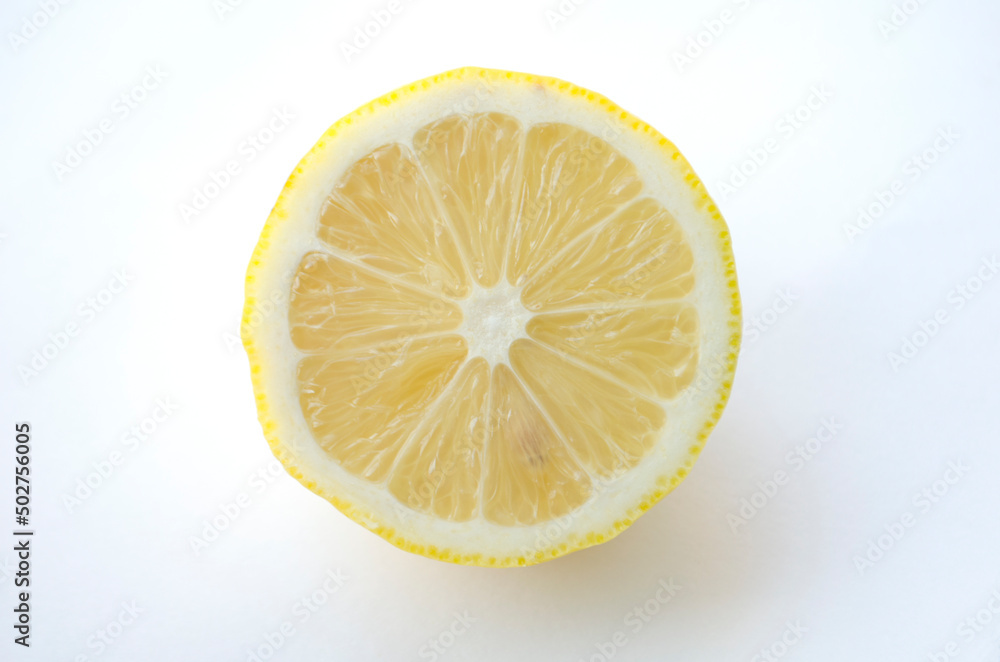 Lemon slice isolated on white, half lemon on white background. Lemon slice isolated on white, half lemon on white background.