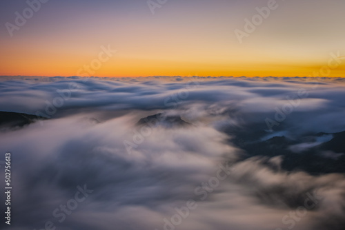 Mountain trail Pico do Arieiro  Madeira Island  Portugal Scenic view of steep and beautiful mountains and clouds during sunrise. October 2021. Long exposure picture