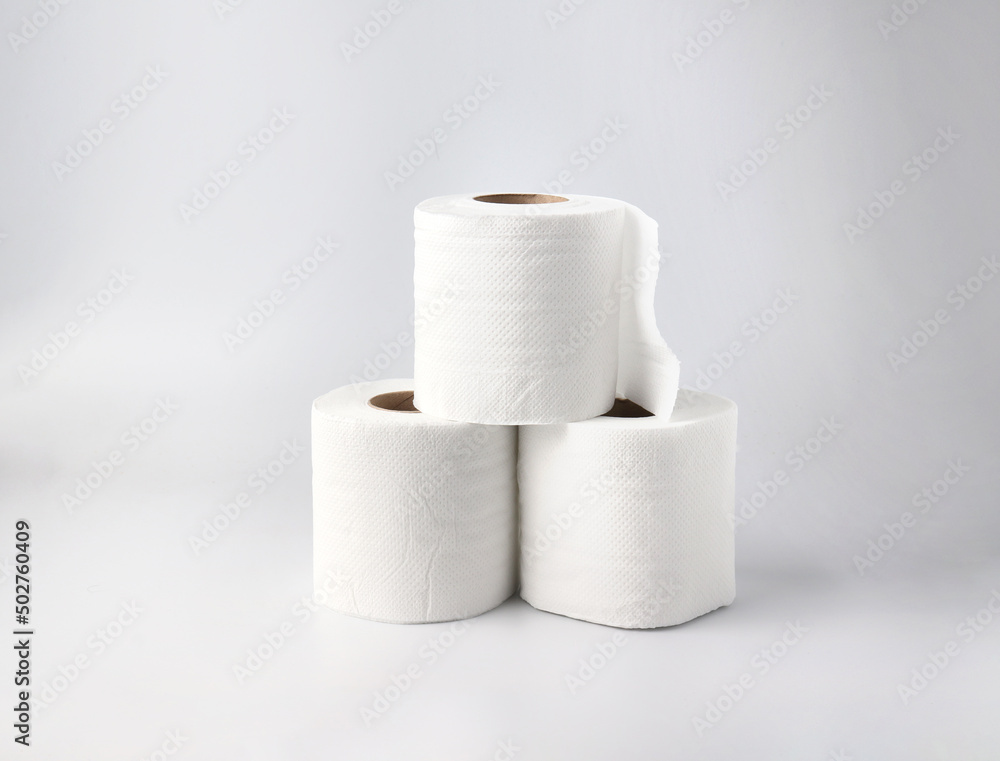 Rolls of toilet paper on light gray background. Rolls of toilet paper on light gray background.