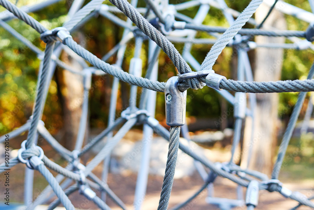 close-up photo of rope climbing net on playground