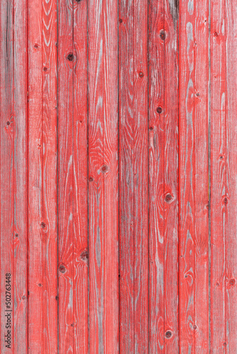 Vintage fence of old wooden boards. Texture of an aging wooden surface. Beautiful wooden background. © sandipruel