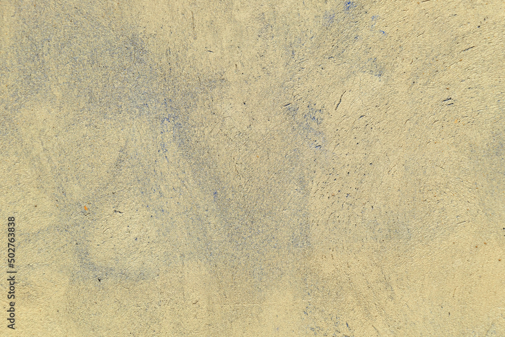 The texture of the old cracked blue plaster. Construction vintage background.