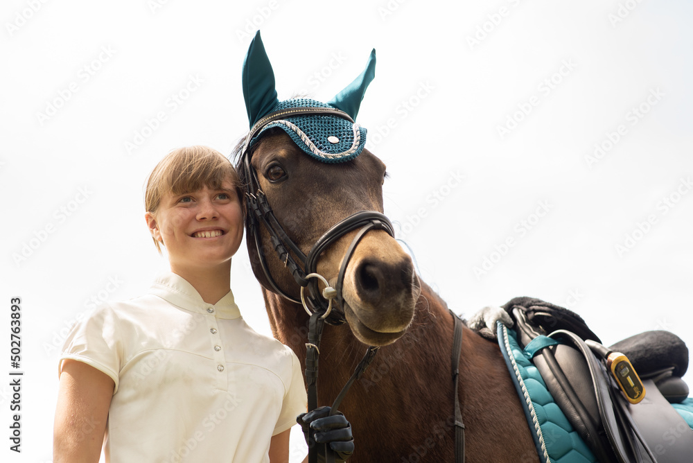 Fototapeta premium Reiterin mit Pferd