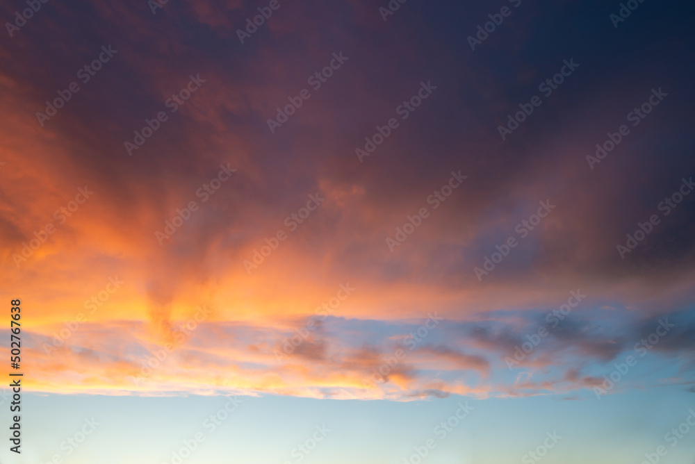 Dramatic sky with clouds at sunset, nature background