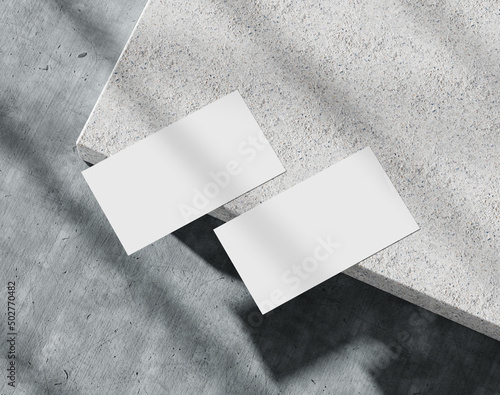 Blank white business card on the concrete, branding paper, 3d rendering, 3d illustration 