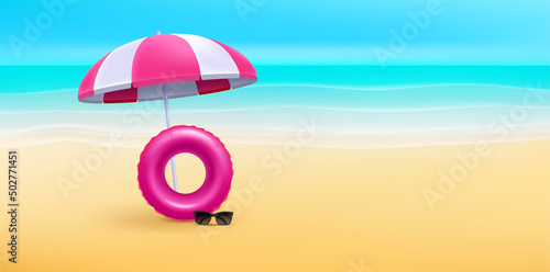 Beach landscape with umbrella and floater