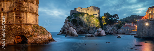 Obraz na plátne Dubrovnik West Harbor and Castle at Night
