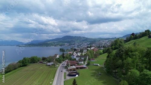 Drone rise and establish to wonderful town Richterswil on the lake Zurich