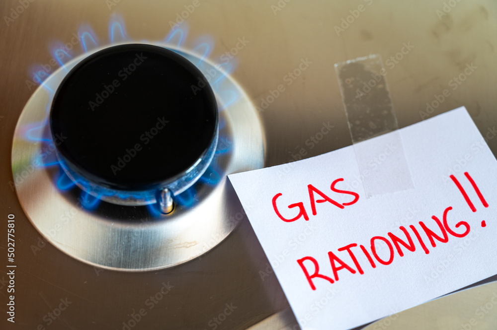 Gas stove, with blank note next to it with the text "gas rationing