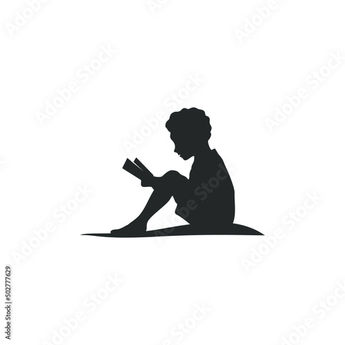 silhouette of a man person with a book