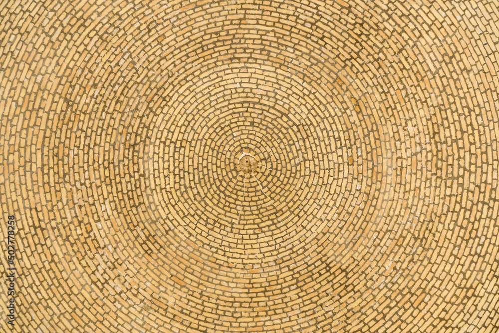 Fototapeta premium Traditional brick laying of the ceiling of one of the domes in the Muslim mausoleum. Shot in Bahoutdin Nakshband Architectural Complex, Bukhara, Uzbekistan