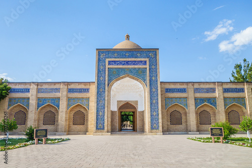 Main entrance to Bahoutdin Architectural Complex in Bukhara, Uzbekistan. Complex was founded in 16th century. Building in  foreground is called the Islamic Gate photo