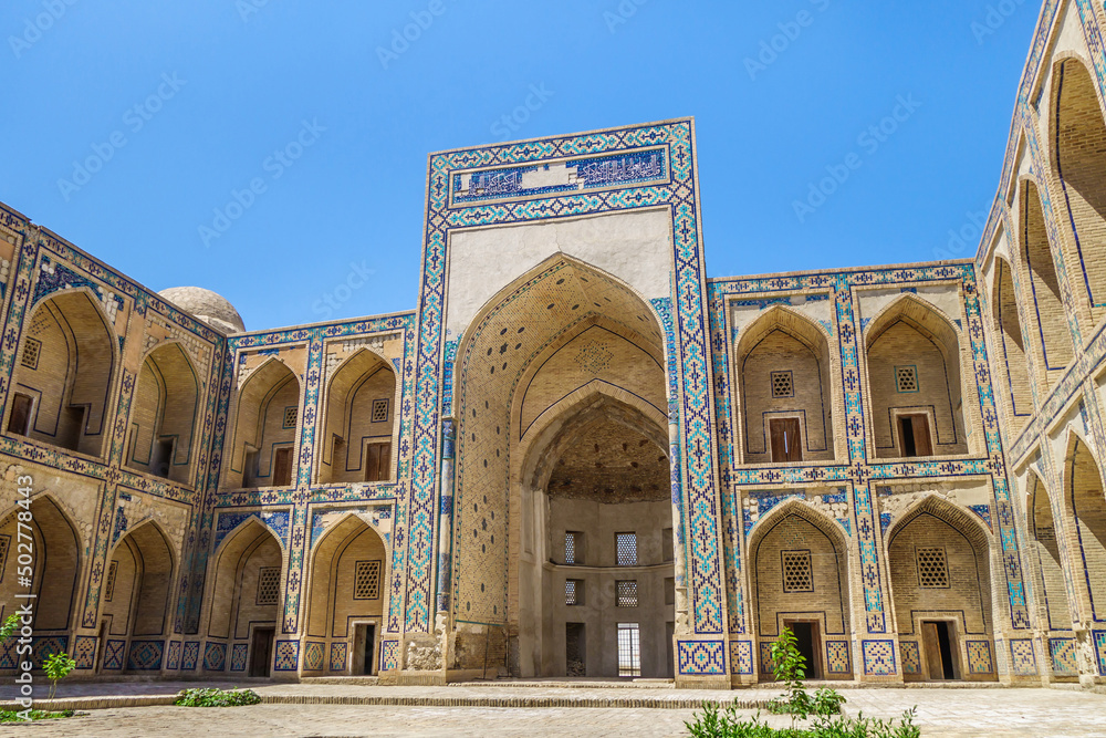 Courtyard of Ulugh Beg Madrasah, Bukhara, Uzbekistan. Structure was built in 1417 by the famous medieval scientist Ulugbek. UNESCO object
