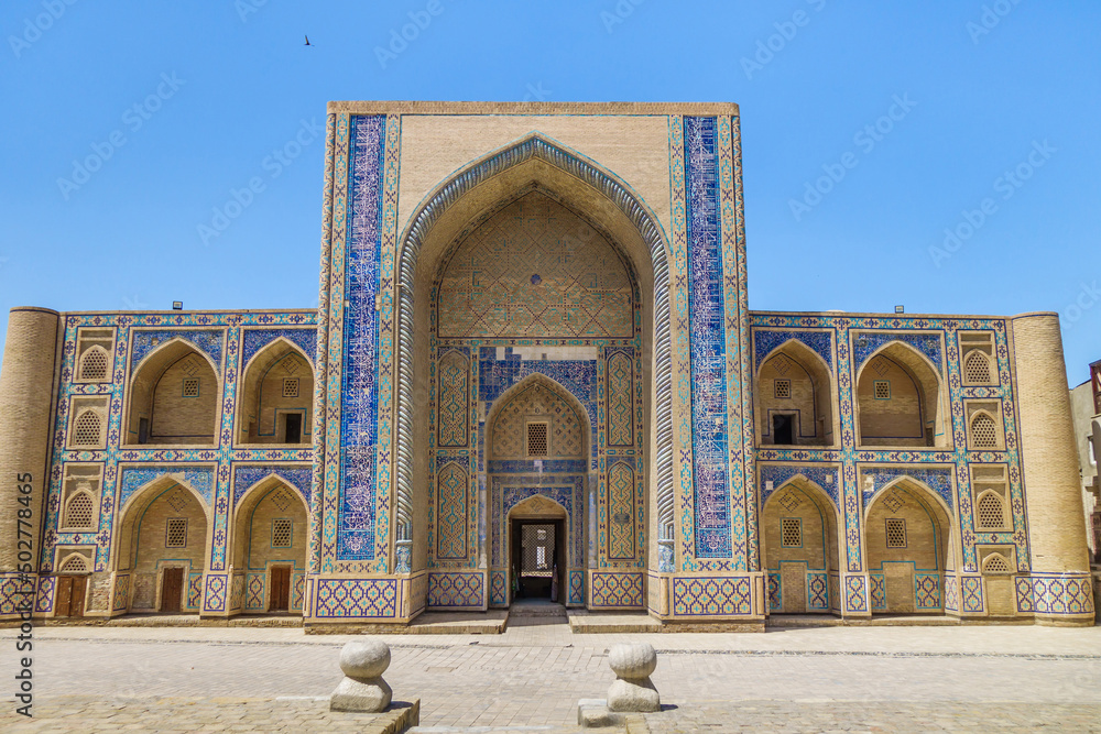 Facade of Ulugh Beg Madrasah in Bukhara, Uzbekistan. Built in 14th century. This is UNESCO object