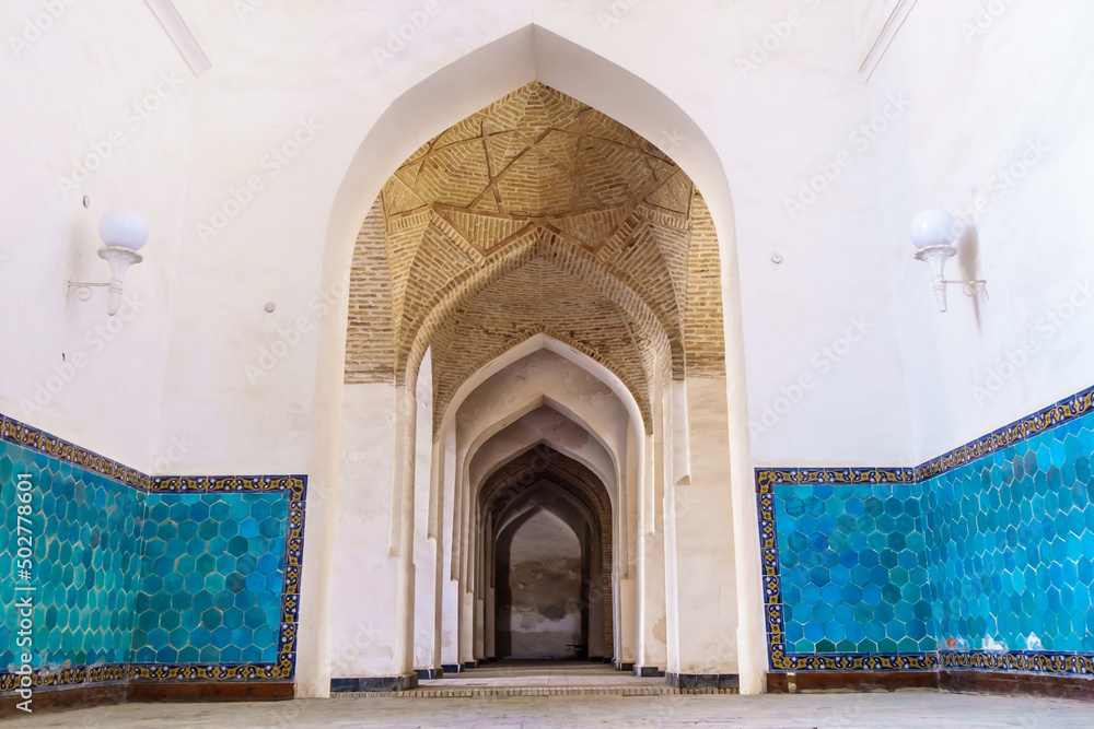 Arch gallery with vaulted ceilings in the structure of the Kalyan Mosque in Bukhara, Uzbekistan