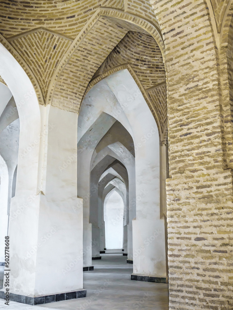 Interweaving of arched passageways with vaulted ceilings in the design of the Kalyan Mosque in Bukhara, Uzbekistan