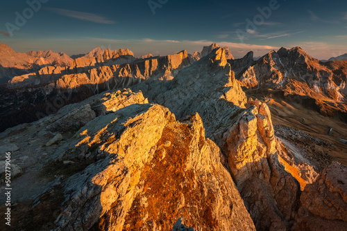 Fototapeta Naklejka Na Ścianę i Meble -  Autumn in the Italian Dolomites. The most beautiful time of the year to visit this place. Beautiful colors and breathtaking views. Mountain peaks above the valleys.