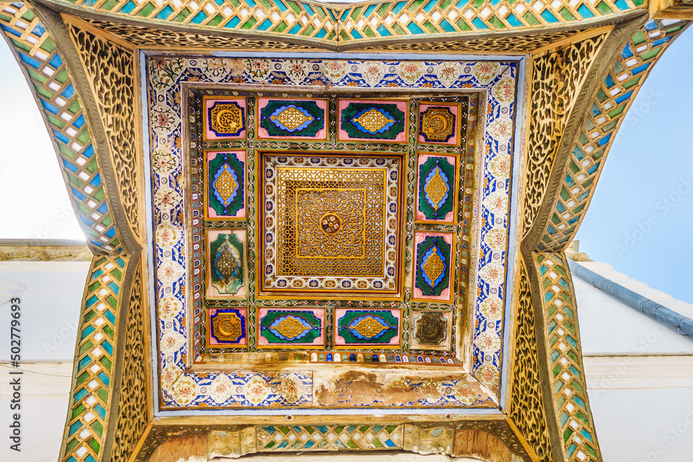 Decorations on the ceiling of the entrance part of the harem building. Shot at the former emir's summer residence Sitorai Mohi Xosa in Bukhara, Uzbekistan