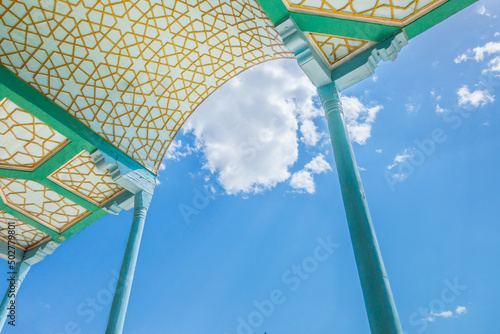 Summer sky as seen from the street gallery at the former emir's country residence, Sitorai Mohi Xosa, in Bukhara, Uzbekistan. View is the same that the emir and his wives saw 100 years ago photo