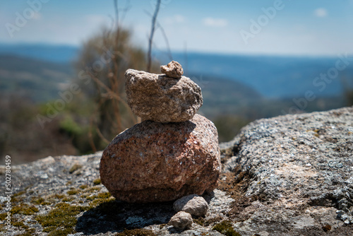 Pirâmide de pedras junto a um muro na vila amuralhada de Ansiães photo