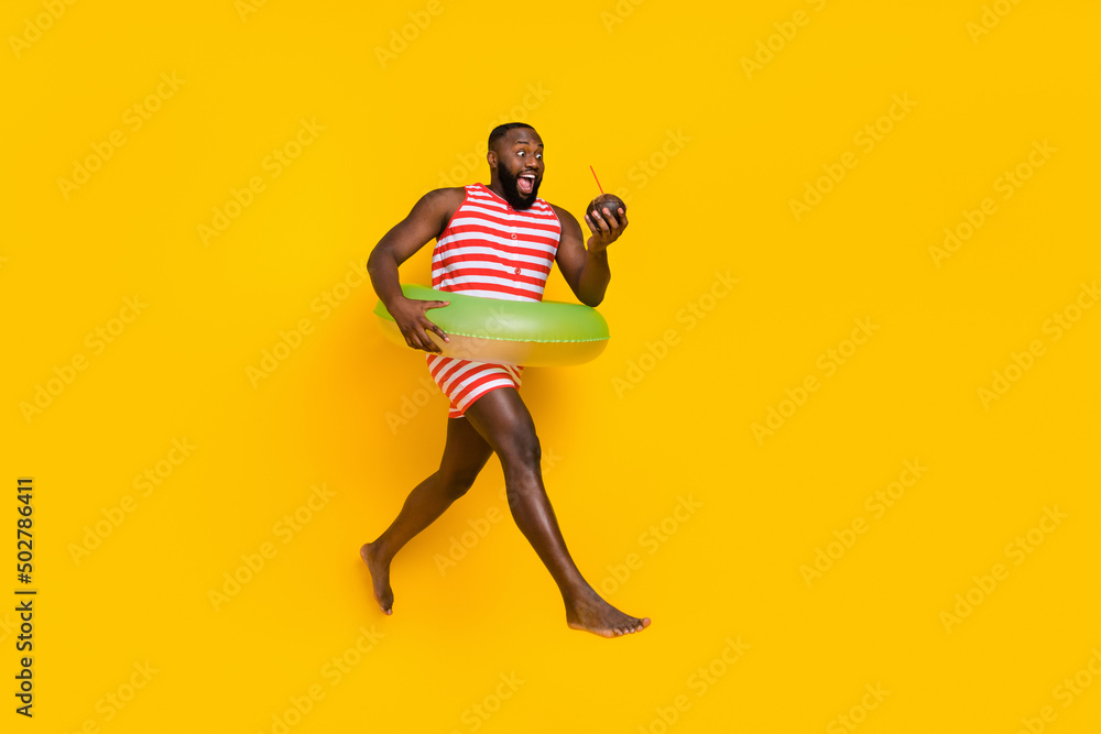 Guy tourist relax jump go buy exotic cocos juice swim water inflatable circle wear suit isolated bright color background