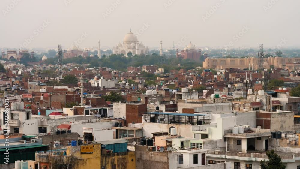 NEW DEHLI, INDIA 01 MARCH 2020: Panorama of Agra city, India. Taj Mahal in the background NEW DEHLI, INDIA 01 MARCH 2020: Panorama of Agra city, India. Taj Mahal in the background