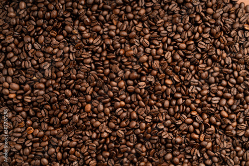 Roasted coffee beans close up view
