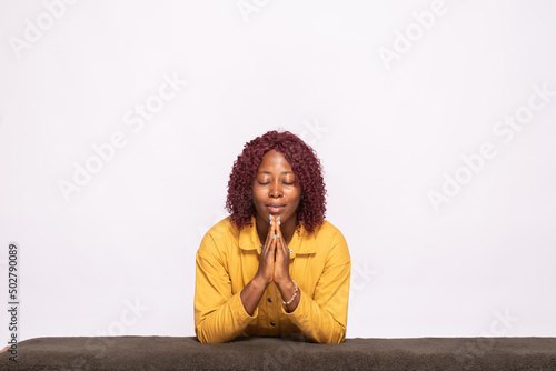 Fotografie, Obraz young african lady saying her prayers