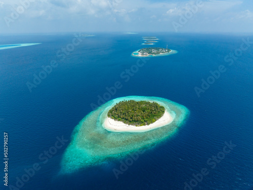 Aerial view of a tropical island in Baa atoll, Maldives