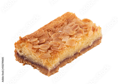 close up of a piece of  almond cake isolated on white background