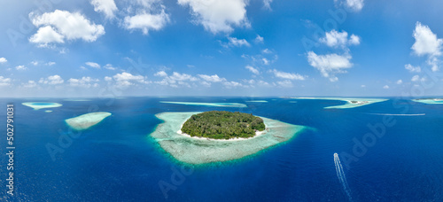Aerial panorama of tropical islands in the Kaafu Atoll, Maldives