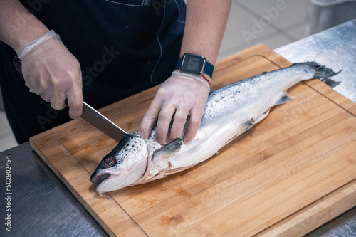 Chef preparing a salmon fis...