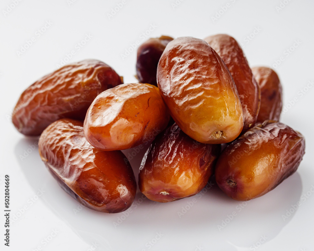 juicy royal dates on a white acrylic background juicy royal dates on a white acrylic background