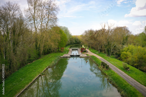 aerial view on the canal of Loing on the village of La Genevraye in France