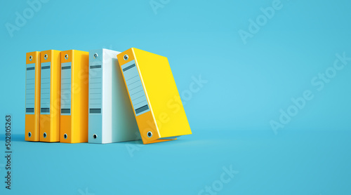 yellow and gray ring binder...