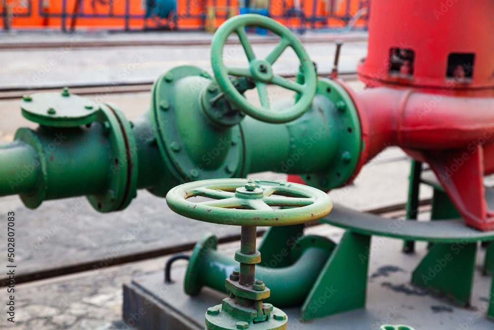 Obraz premium Industrial pipeline system with valve.