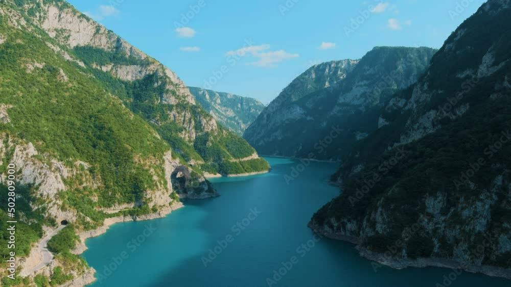 Montenegro. Durmitor National Park. Pivo lake. Canyon of the Tara River. Intense water color. Drone. Aerial view. Flight over the canyon. The camera moves backward Montenegro. Durmitor National Park. Pivo lake. Canyon of the Tara River. Intense water color. Drone. Aerial view. Flight over the canyon. The camera moves backward
