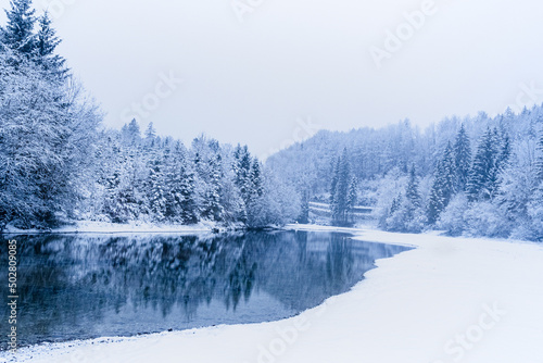 winter landscape with reflection in the mountains
