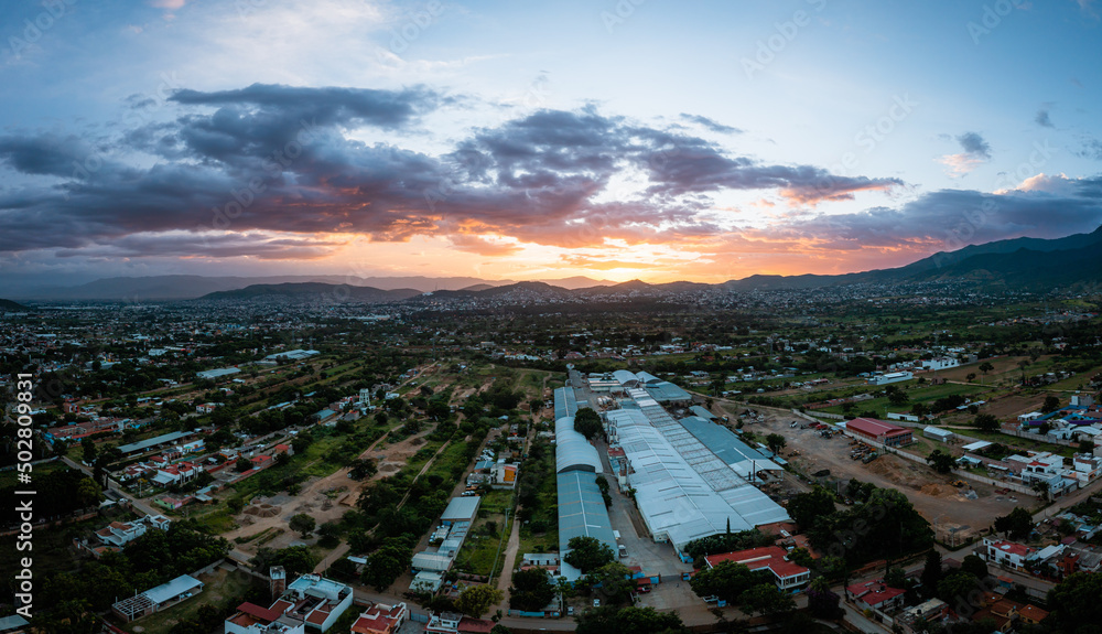 Aerial drone photography of the city of Oaxaca during sunset from San Francisco Tutla